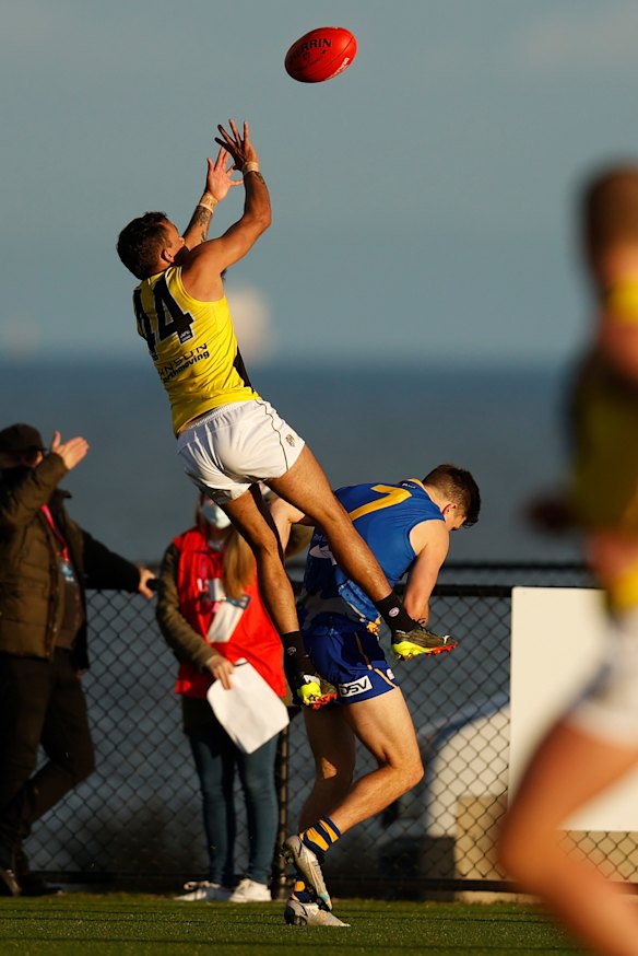 Stack flies for a mark against Williamstown in June.