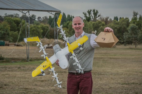 Wing delivery project manager Luke Barrington takes delivery of a hot lunch from Guzman Y Gomez during the Bonython trial last year. 