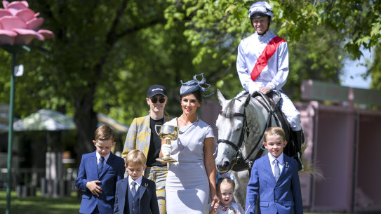 Jockey Kerrin McEvoy and wife Cathy with their children at the launch of the Melbourne Cup Carnival.