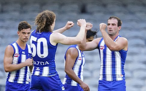 Two goals by Ben Cunnington (right) were like gold for the Roos as they came from the clouds to edge St Kilda.
