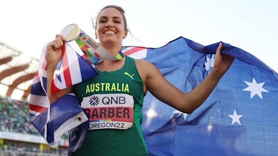 Kelsey-Lee Barber with the prize after defending her world javelin title.