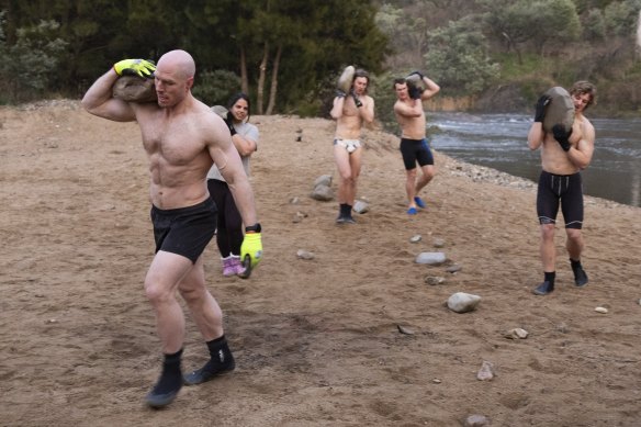 Senator David Pocock during a physical training session along the banks of the Murrumbidgee River.