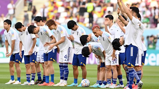 Japan celebrate a famous win.