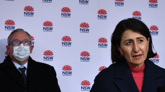 Gladys Berejiklian and Brad Hazzard on Sunday: Sydney is heading for a longer lockdown, as cases continue to rise.