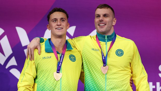 Flynn Southam (gold) and Kyle Chalmers (bronze) during the Australian national anthem.