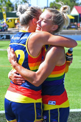 Adelaide’s Marijana Rajcic and Erin Phillips celebrate the win.
