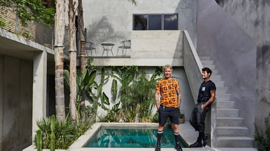 Gary Chard (left) and Feskie Rodriguez by the pool. “Our philosophy was to build a house that would mature and age gracefully,” says Chard. “It was never about chasing perfection. We wanted marks and imperfections to be part of its story.”