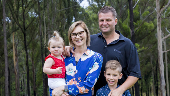 Erin and Adrian Maher with their children Mahli, 1, and Nate, 6, at home in Malua Bay.