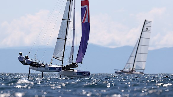 Jason Waterhouse and Lisa Darmanin of Team Australia sail during a Nacra 17 practice race in Enoshima.
