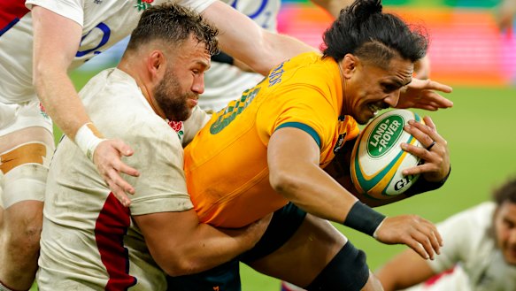 Unstoppable: Pete Samu about to score in the first Test against England at Optus Stadium in Perth.