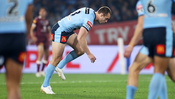Isaah Yeo stumbles after being hit while making the opening tackle of the match.