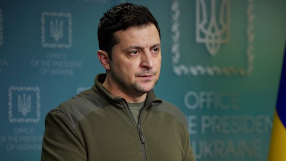 Ukrainian President Volodymyr Zelensky, in military garb, addresses his nation as Russian troops invade from across the countries’ shared border. 