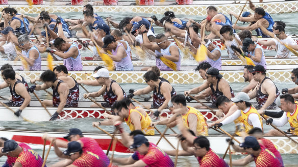 Competitors take part in the annual dragon boat race to celebrate the Tuen Ng festival in Hong Kong.