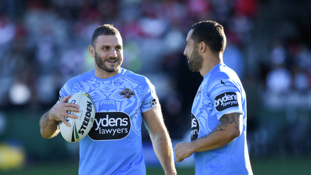 Old guard: Tigers veterans Robbie Farah (left) and Benji Marshall are part of the leadership group.