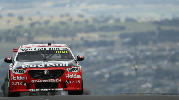 Jamie Whincup comes into view at Mount Panorama.