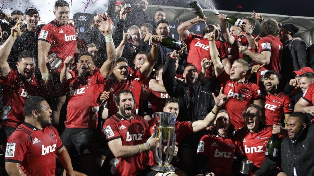 Champions: The Crusaders celebrate their ninth Super title last year - but their historic name could now change.
