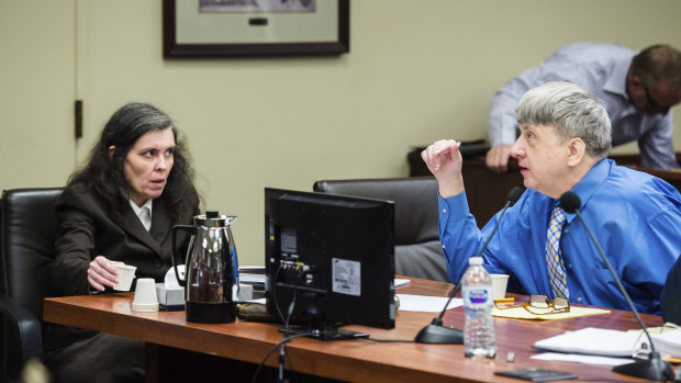 Louise Turpin, left, and her husband, David Turpin, right, appear for a preliminary hearing  on Wednesday.