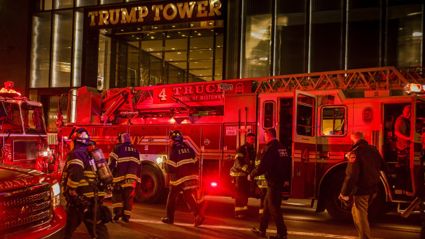 Firefighters outside Trump Tower on Saturday evening. 