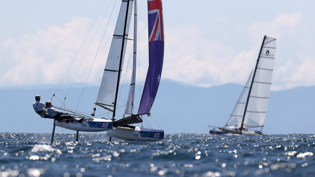 Jason Waterhouse and Lisa Darmanin of Team Australia sail during a Nacra 17 practice race in Enoshima.