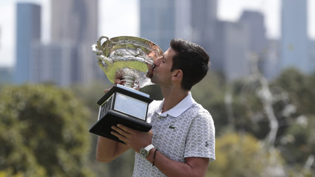 Regular winner: Novak Djokovic with the Australian Open trophy.