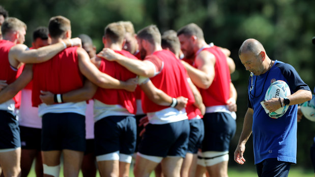 Boot camp: Eddie Jones and England during a training session in Miyazaki.
