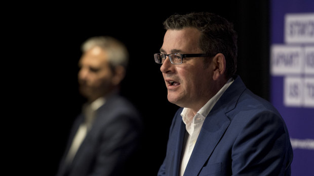 Victorian Premier Daniel Andrews (right) and Chief Health Officer Brett Sutton announce changes to lockdown restrictions on Monday.