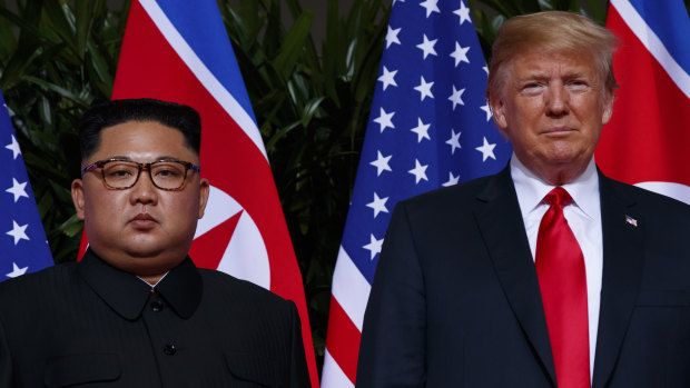 President Donald Trump stands with North Korean leader Kim Jong-un during a meeting on Sentosa Island, in Singapore, in June last year. That meeting is deemed to have achieved little of substance.