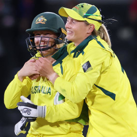 Meg Lanning and Alyssa Healy celebrate World Cup victory in Christchurch.