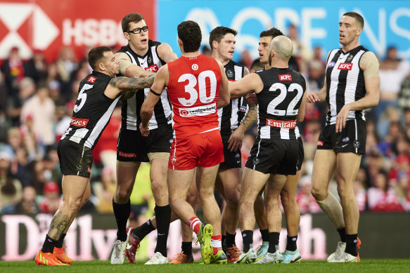 Tom McCartin scuffles with Mason Cox as tensions bubble over.