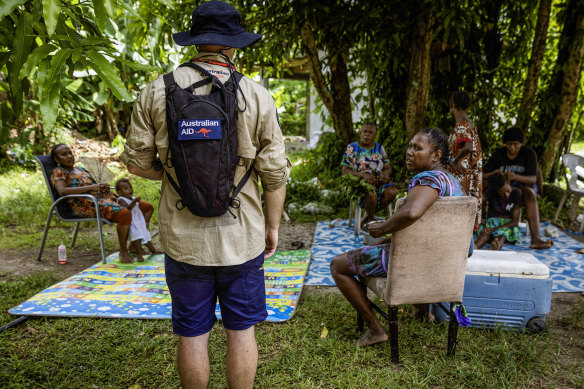 Australian aid workers assist locals in Vanuatu following Tuesday’s earthquake.