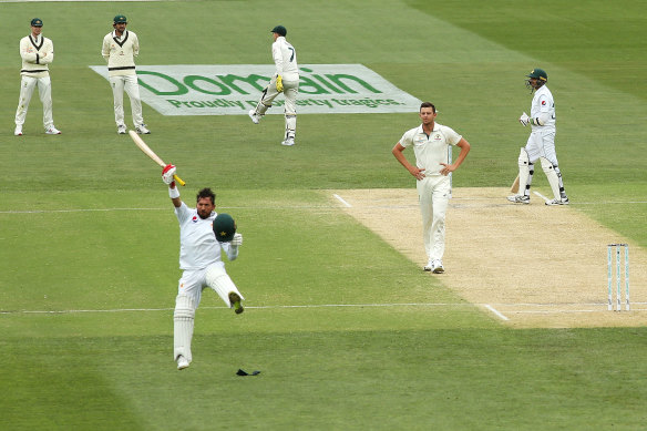 A jubliant Yasir Shah celebrates his century at Adelaide Oval.