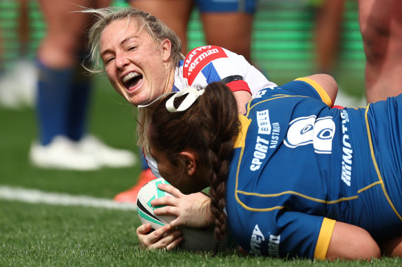 Olivia Higgins celebrates what proved the match-winning try for Newcastle.