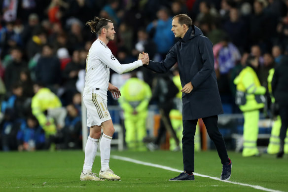 Gareth Bale and PSG manager Thomas Tuchel shake hands after Real Madrid and PSG's 1-1 draw.