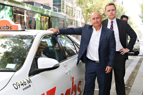 Former taxi driver Nick Andrianakis, lead plaintiff in the class action against Uber, and Michael Donelly, class action principal lawyer at Maurice Blackburn Lawyers, outside the Supreme Court.