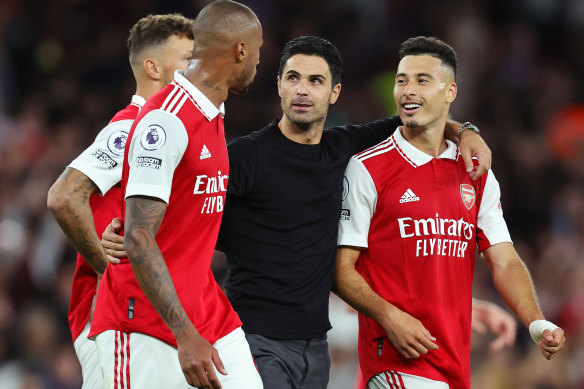 Arsenal manager Mikel Arteta celebrates with his players after the Gunners maintained their perfect start to the season.
