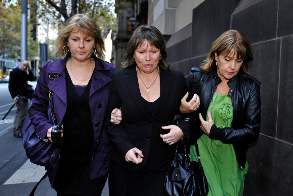 Dawn Waite (centre) is helped by friends leaving court after an emotional afternoon giving evidence in 2010.