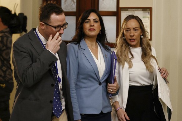 Victorian Liberal MP Moira Deeming (centre) enters the party room meeting on Monday.