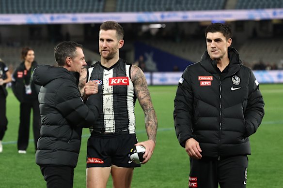 Craig McRae, Jeremy Howe and Brayden Maynard of the Magpies.