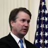 Kavanaugh sworn in again as Trump declares sexual assault claims a 'hoax'