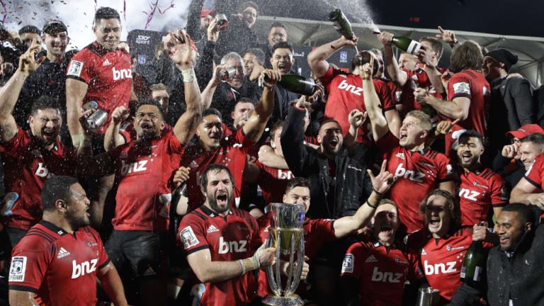 Spoils to the winners: The Crusaders celebrate their remarkable ninth Super title.