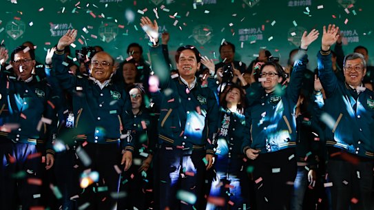 Taiwan’s President-elect Lai Ching-te celebrates after winning the vote on Saturday night. 