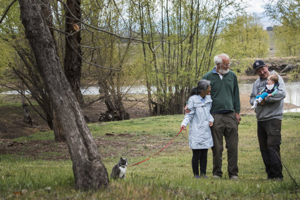 Dave and Hideko Petony on their Wallaroo property pictured with Dave's son Ben and his daughter Sage and their cat Gan Chan. 