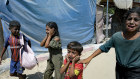 Palestinian children are evacuated from a site hit by an Israeli bombardment on Khan Younis, southern Gaza Strip.