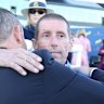 Chris Waller embraces Nash Rawiller.