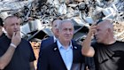Israel’s Prime Minister Benjamin Netanyahu visits the site of the Weizmann Institute of Science, which was hit by missiles fired from Iran, in the central city of Rehovot.