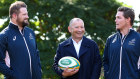 Wallabies head coach Eddie Jones is flanked by co-captains James Slipper and Michael Hooper. Rugby Australia is being eyed off by private equity.