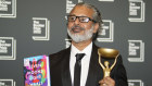 Shehan Karunatilaka holds the Booker Prize.