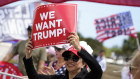 Supporters of Donald Trump outside the Trump International Golf Club in Florida. 