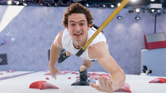 Adam Ondra, of the Czech Republic, participates during the speed qualification section of the men’s sport climbing.