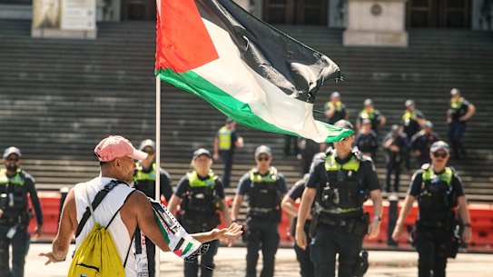 Police were taking no chances during the protests, moving on anyone who ventured into the intersection.